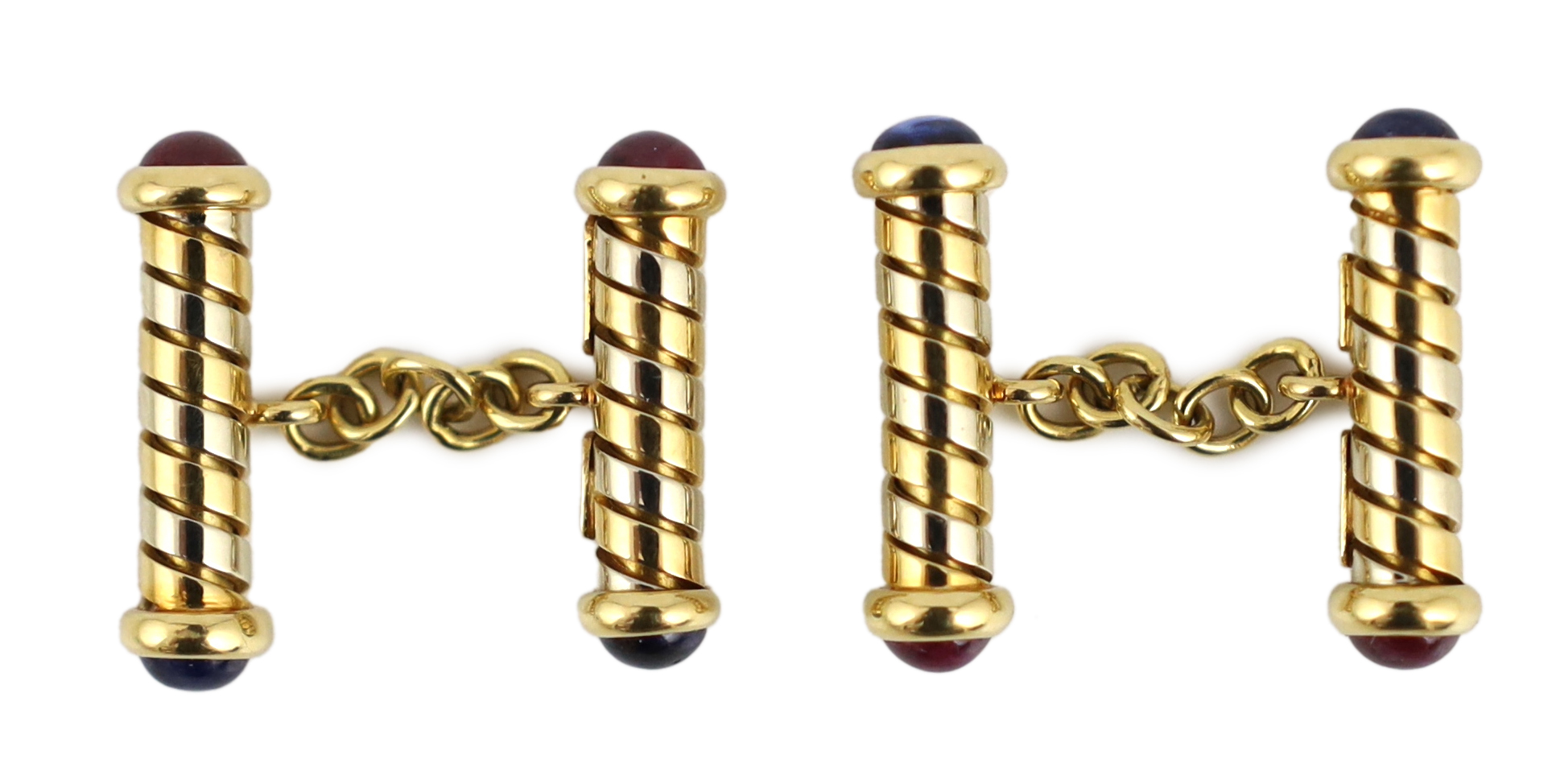 A pair of Italian Bulgari two colour 18ct gold and cabochon ruby and sapphire set baton cufflinks